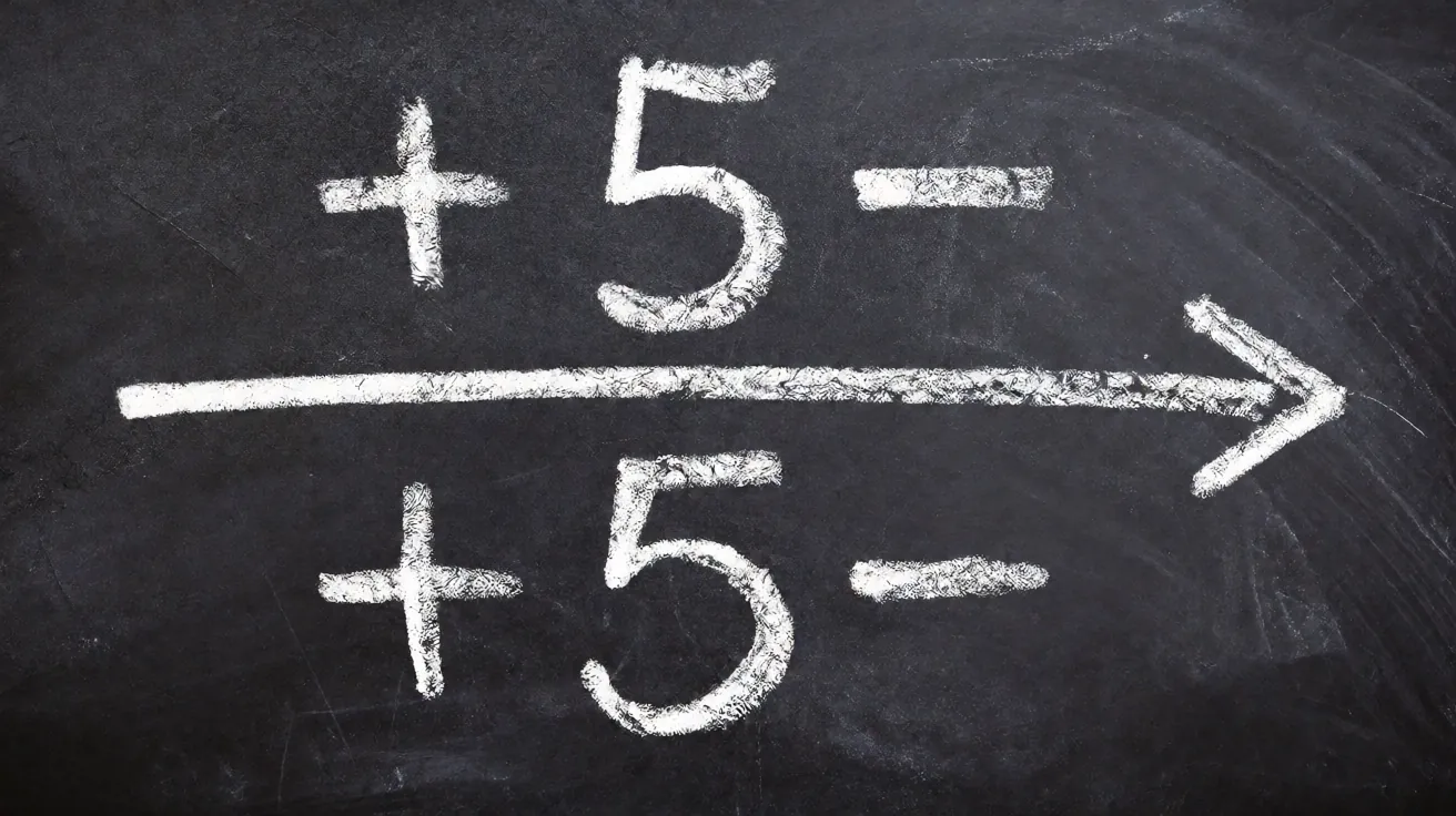 Chalkboard showing point spread plus and minus numbers
